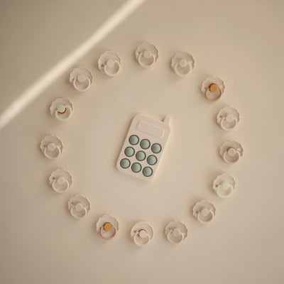 Mushie Phone Press Toy | Cambridge